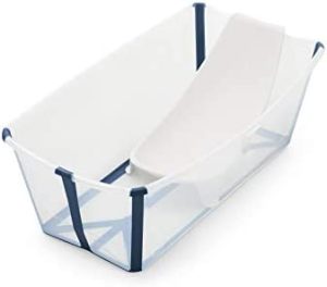 STOKKE® Flexi Bath® - Bañera bebé plegable con asiento para recién nacidos │ Piscina portátil para niños hasta los 4 años - Color: Transparent Blue